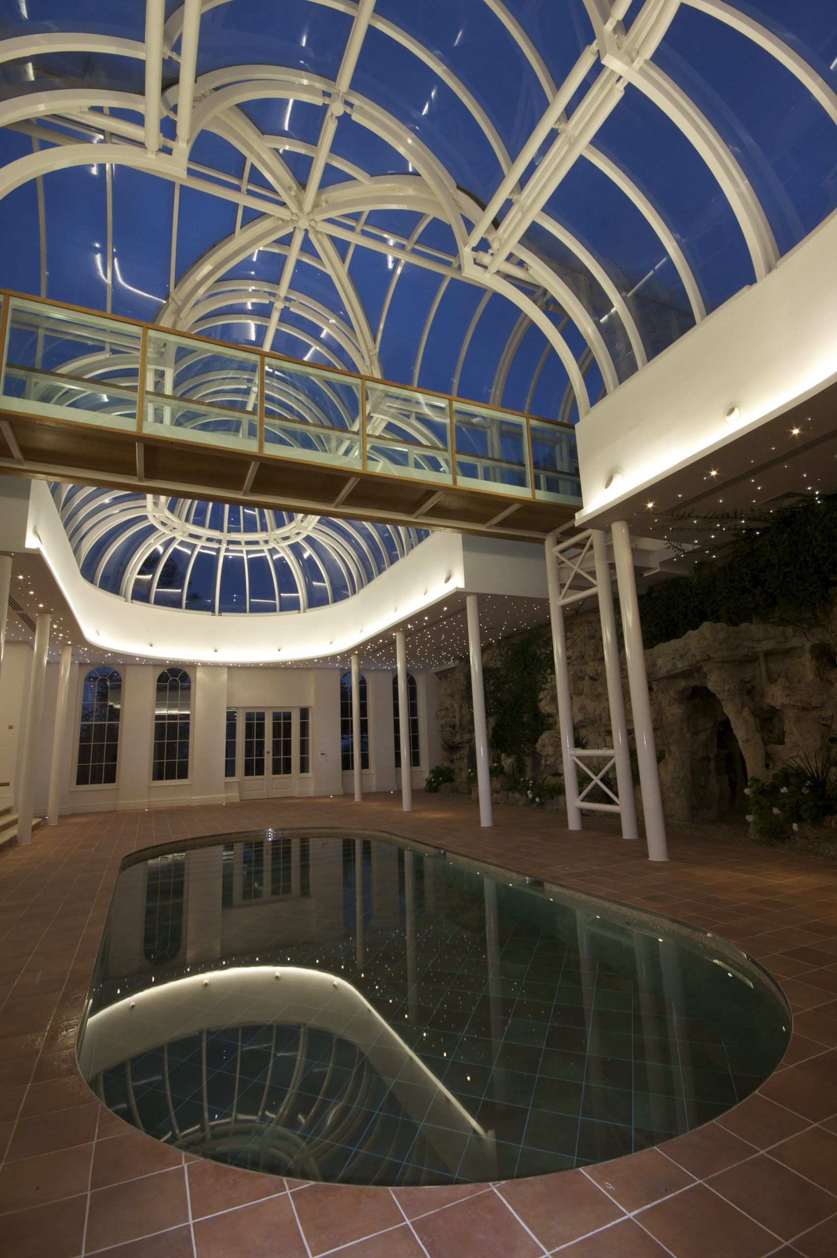 Pool area of winter garden showing lighting scene