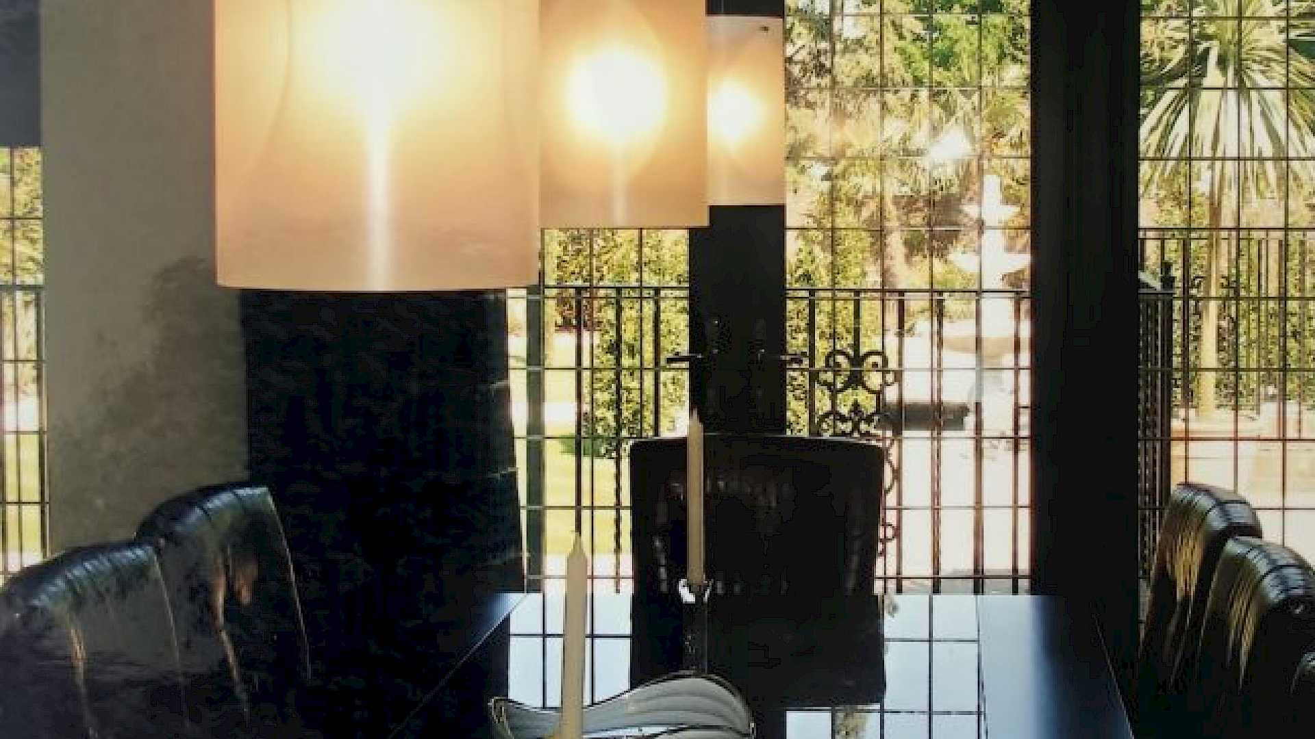 Elegant smart lighting for dining room, showing fittings above dining table