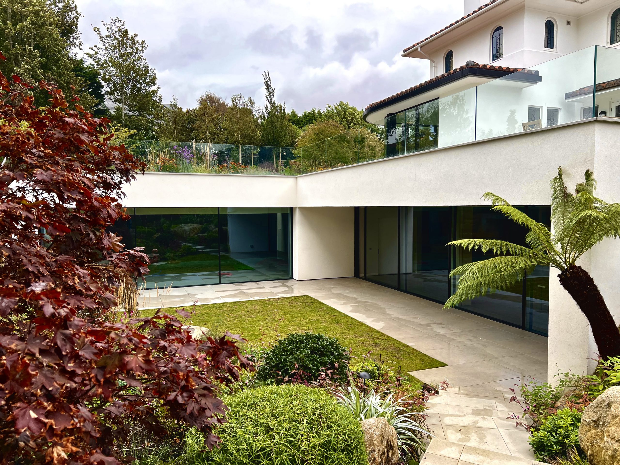 Indoor basement pool and garden. Intelligent lighting system controls the movements of the door.