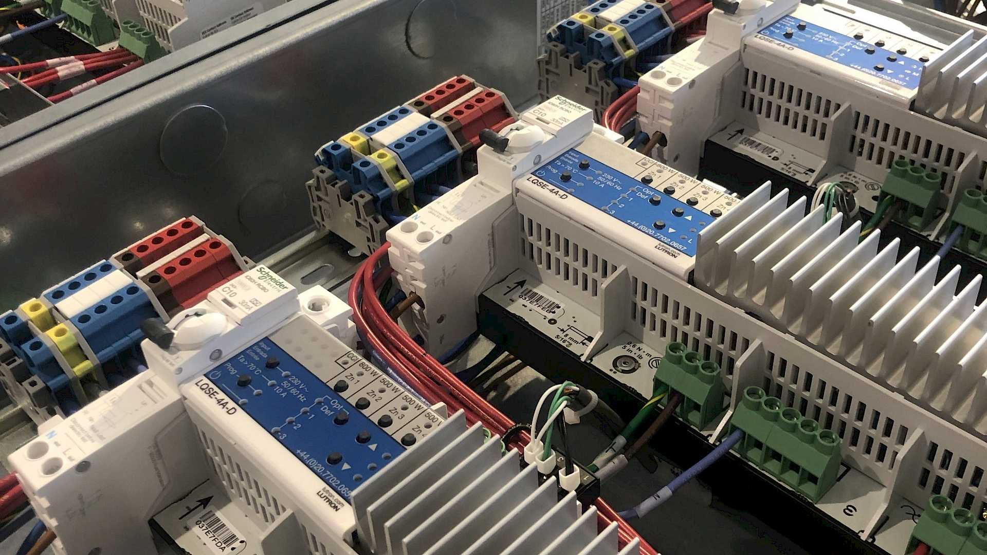 Two Lutron lighting panels with modules and processor