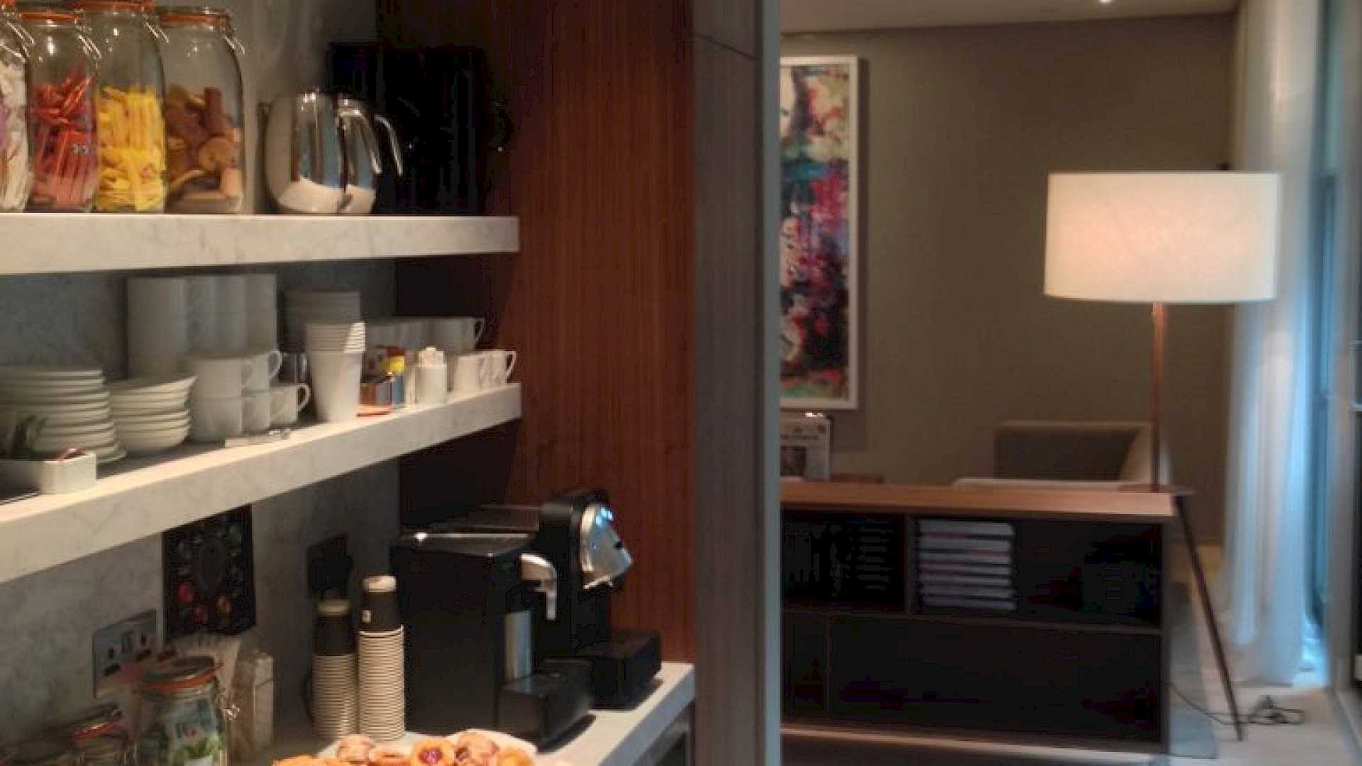 The finished kitchen break out area, with Lutron lighting.