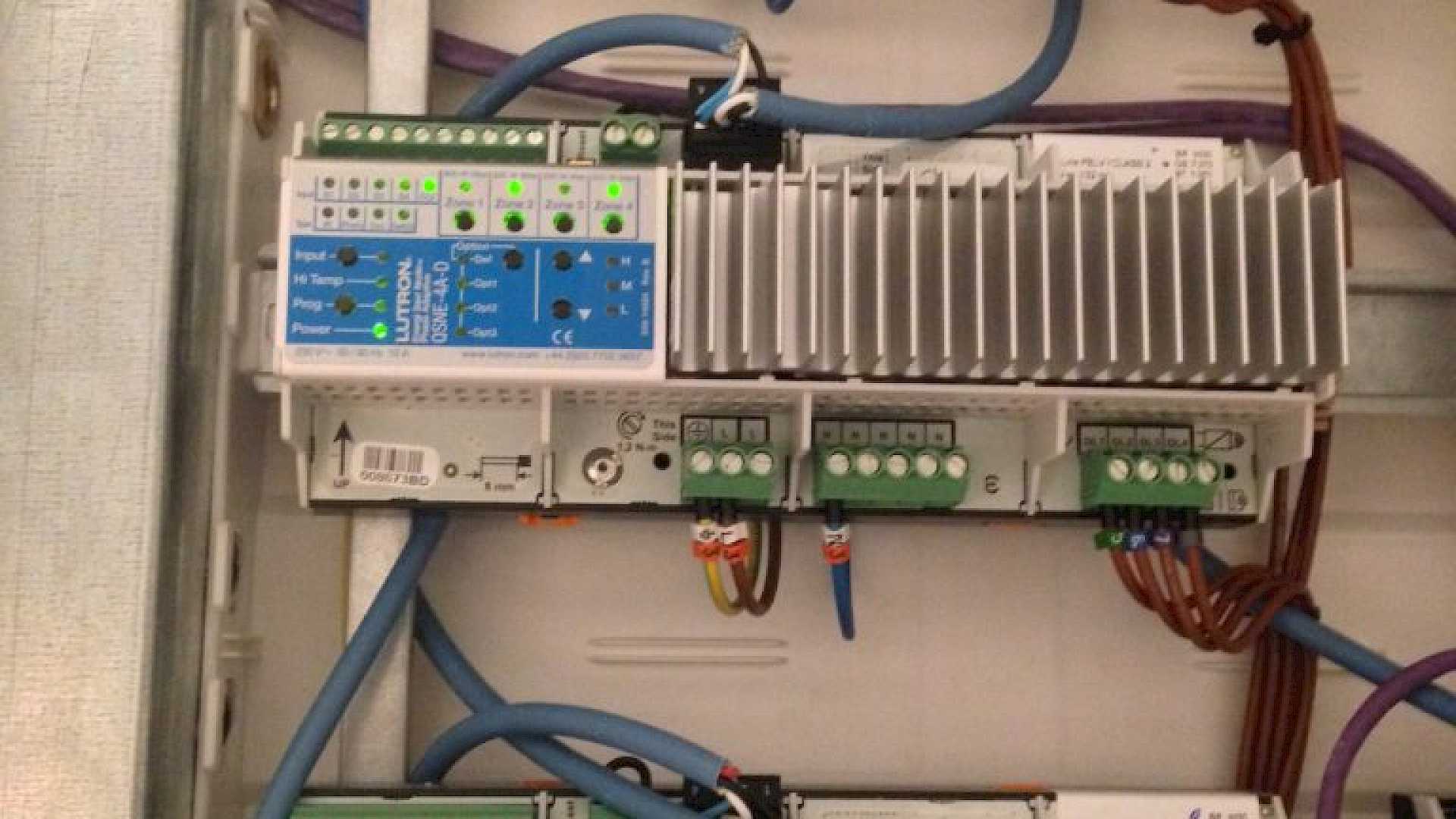 Panel with lighting dimmer modules, Lutron Energi Savr Node