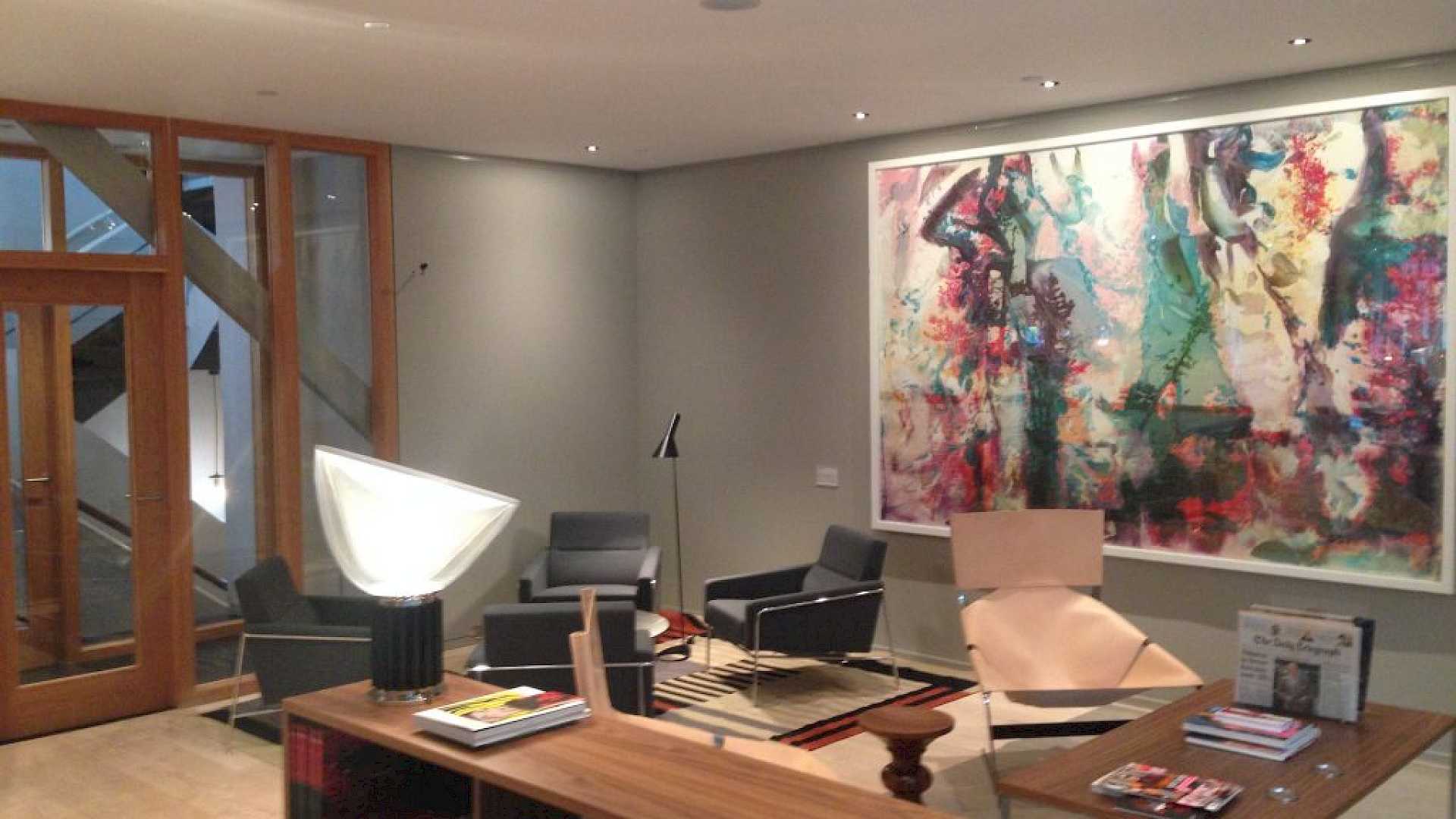 Finished reception area with lighting controlled by Lutron Energi Savr Node.