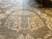 Even the rug in this small home cinema is a nod to the clients film collection.