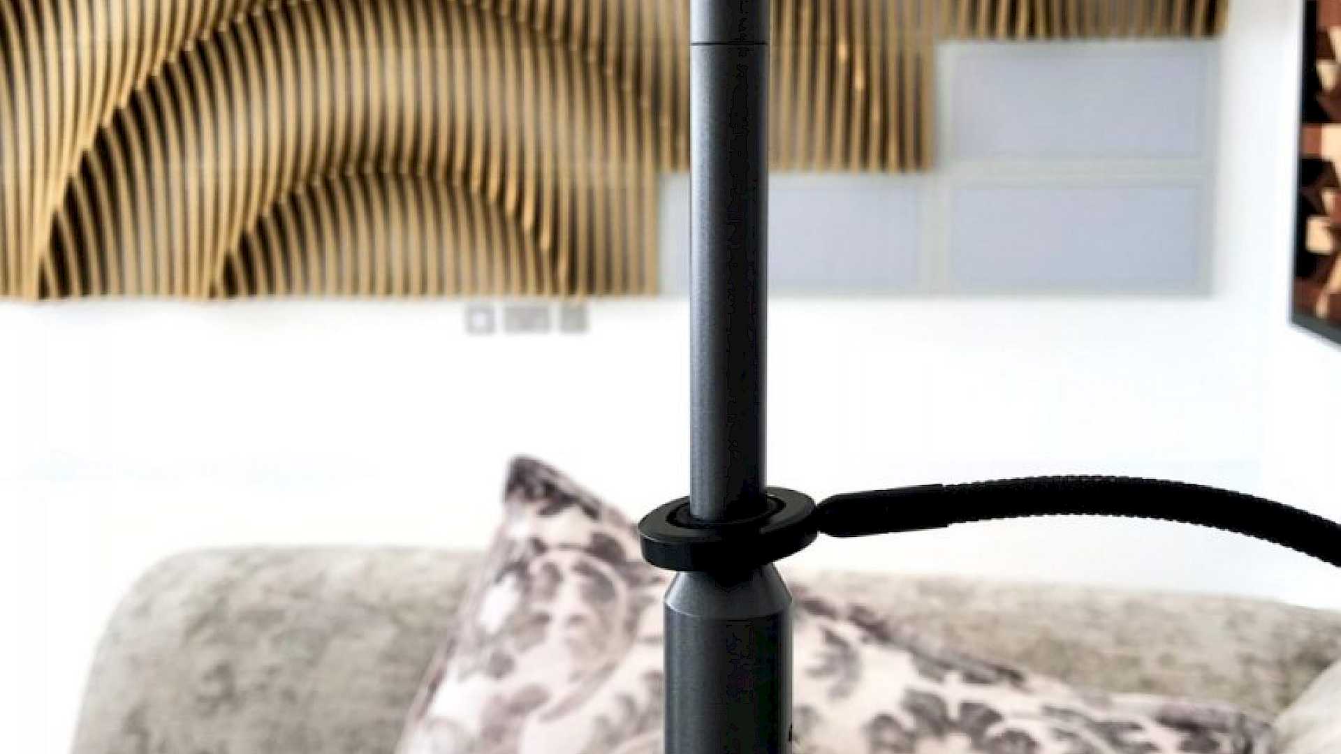 Acoustic analysis of the room, shows equipment and treatment in background.