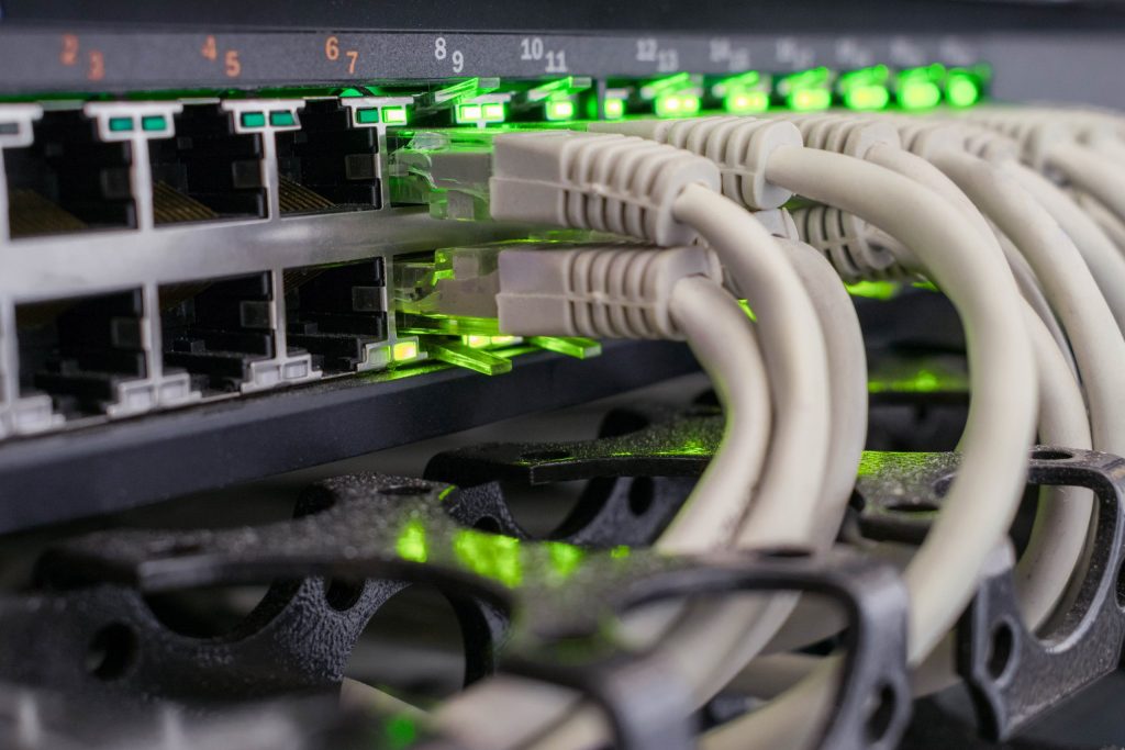 Image showing patch panel with network cables, data networks are fundamental to the delivery of smart home systems.