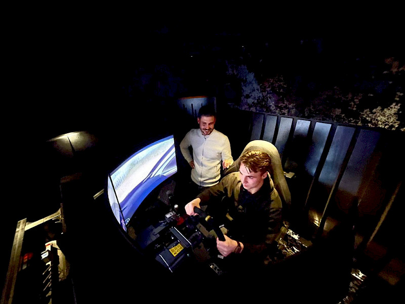 Home cinema demo - gaming experience with racing chair.